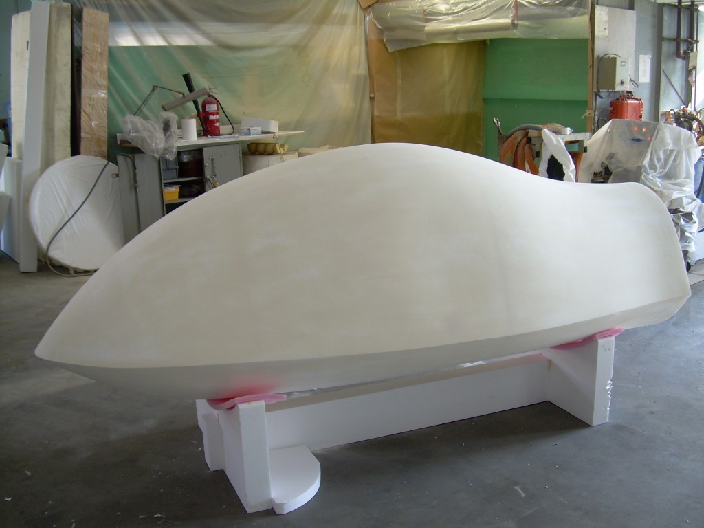 Any guesses as to what this is? Advanced Foam just shipped this nicely shaped piece for an upcoming TV series episode. The piece was made of 26 machine-cut “baloney slices,” all different, laminated together and then hand-shaped by our crew of craftsmen. The finished piece is pictured here after being finish sanded and after being sprayed with Polycoat.